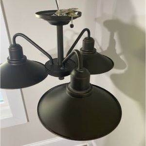 3 light semi flush mount in olde bronze.  Builder sent wrong one.  Never used.